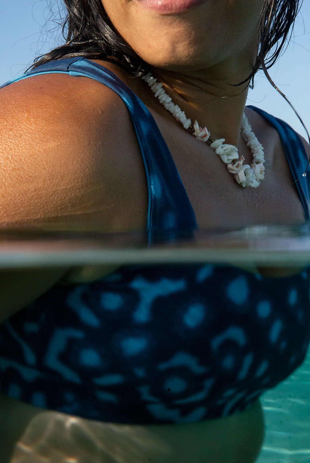 Close-up of Whale Shark bikini top with blue and white dotted marine animal print, eco-friendly scoop neck sports bra swimwear, sustainable active swimwear UK.
