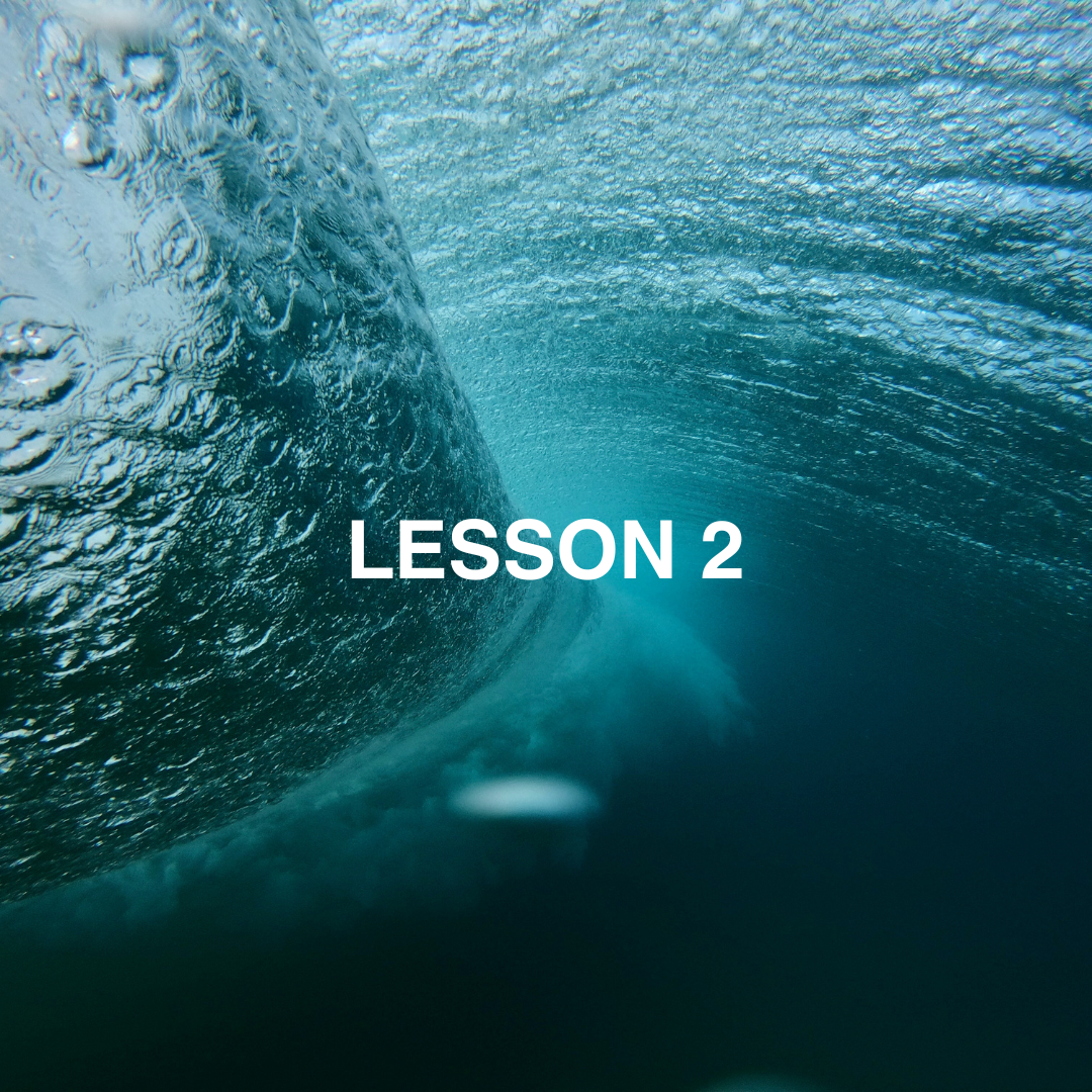 Underwater view of a wave with 'Lesson 2' text.