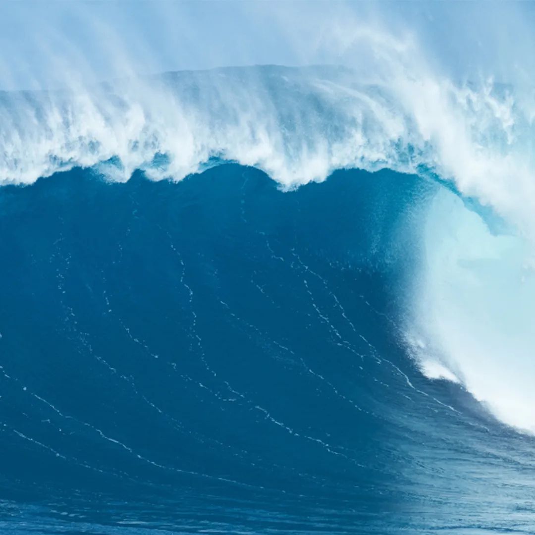 Powerful ocean wave breaking in deep blue water, symbolising NAUTRA's slogan - BE THE WAVE- in other words the energy, scale, and importance of protecting our oceans. 