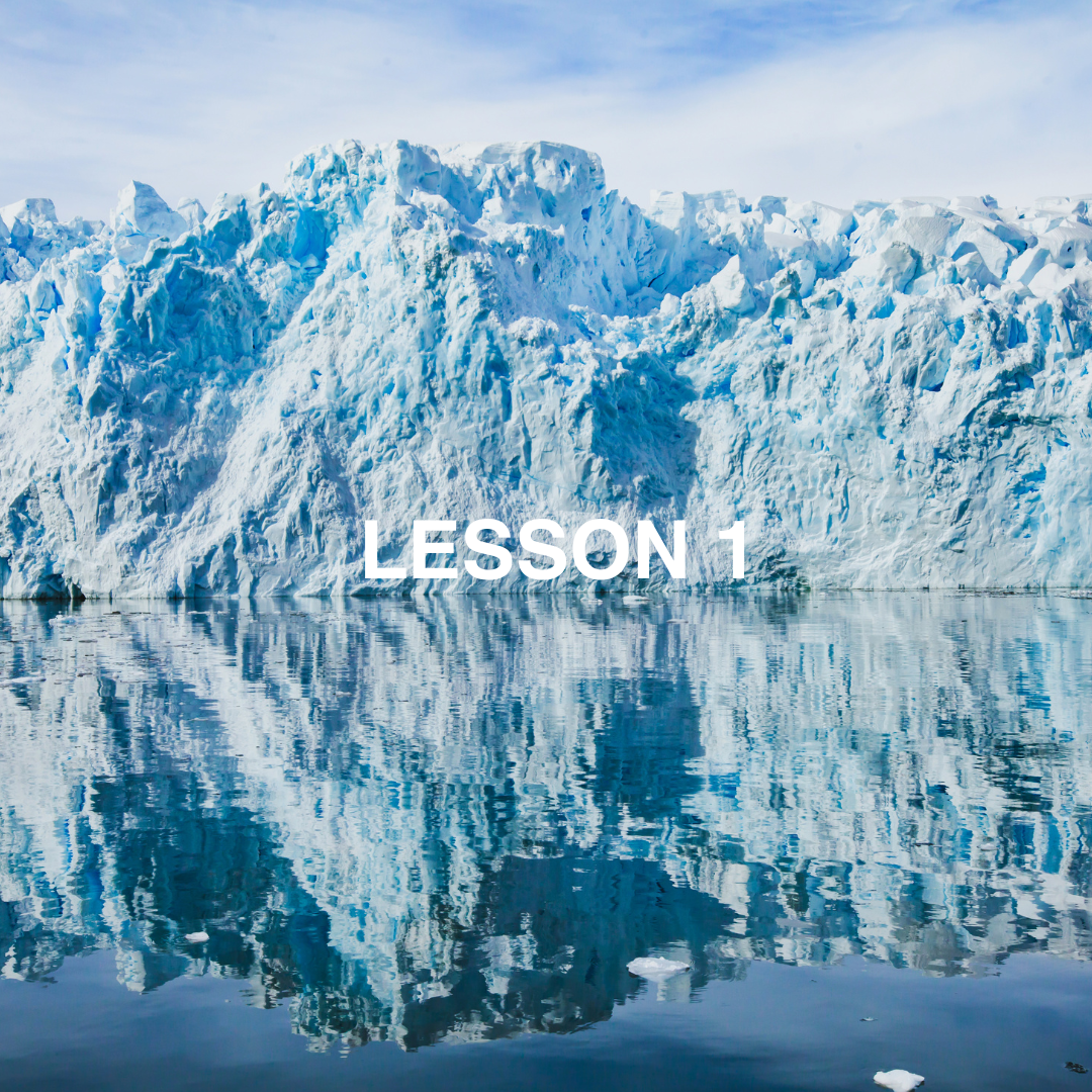 Glacier reflecting in ocean.