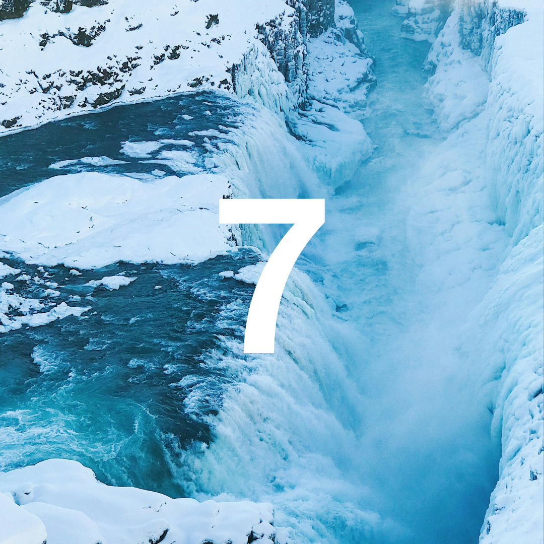 Frothy waterfall with a large number '7' superimposed