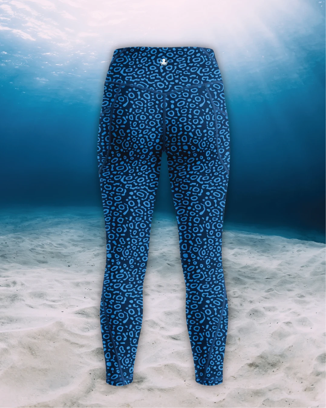 Eagle Ray Full Length Active Swim Leggings back view on ghost mannequin, made from recycled fishing nets and designed for movement in and around the water.