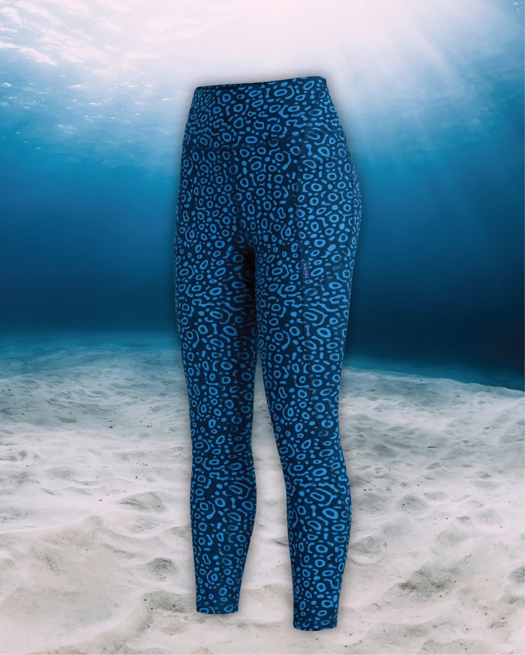 Eagle Ray Full Length Active Swim Leggings sideview on ghost mannequin, made from recycled fishing nets and designed for movement in and around the water.