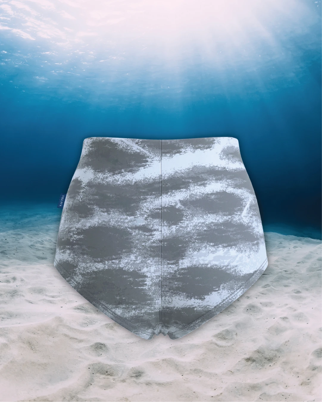 Tiger Shark High Waisted Surf Shorts back view on ghost mannequin, made from recycled fishing nets and designed for movement in and around the water.