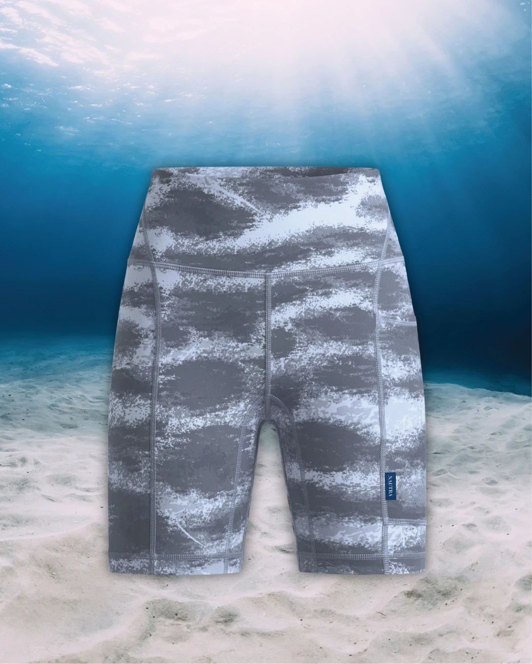 Tiger Shark Active Swim Biker Shorts front view on ghost mannequin, made from recycled fishing nets and designed for movement in and around the water.