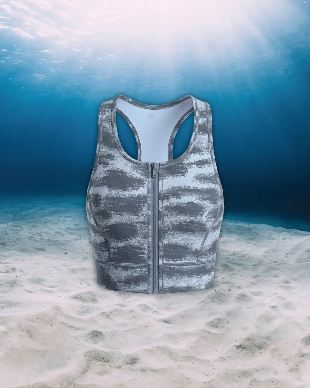 Tiger Shark Racer Back Zip Sports Bra Bikini Top front view on ghost mannequin, made from recycled fishing nets and designed for movement in and around the water.