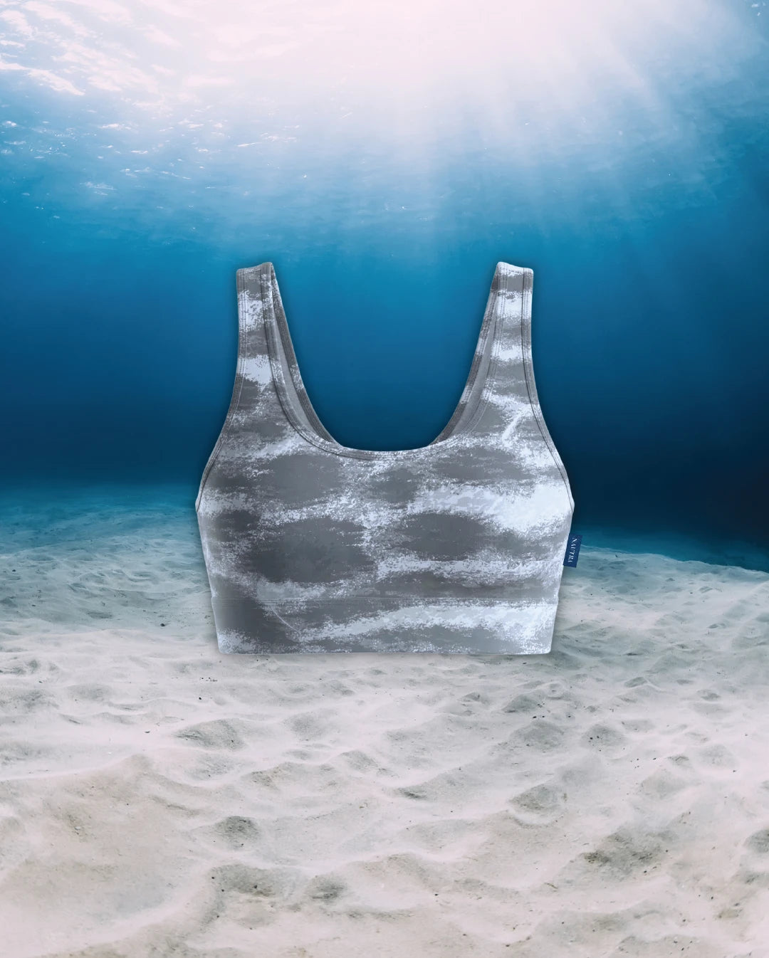 Tiger Shark Scoop Neck Sports Bra Bikini Top front view on ghost mannequin, made from recycled fishing nets and designed for movement in and around the water.