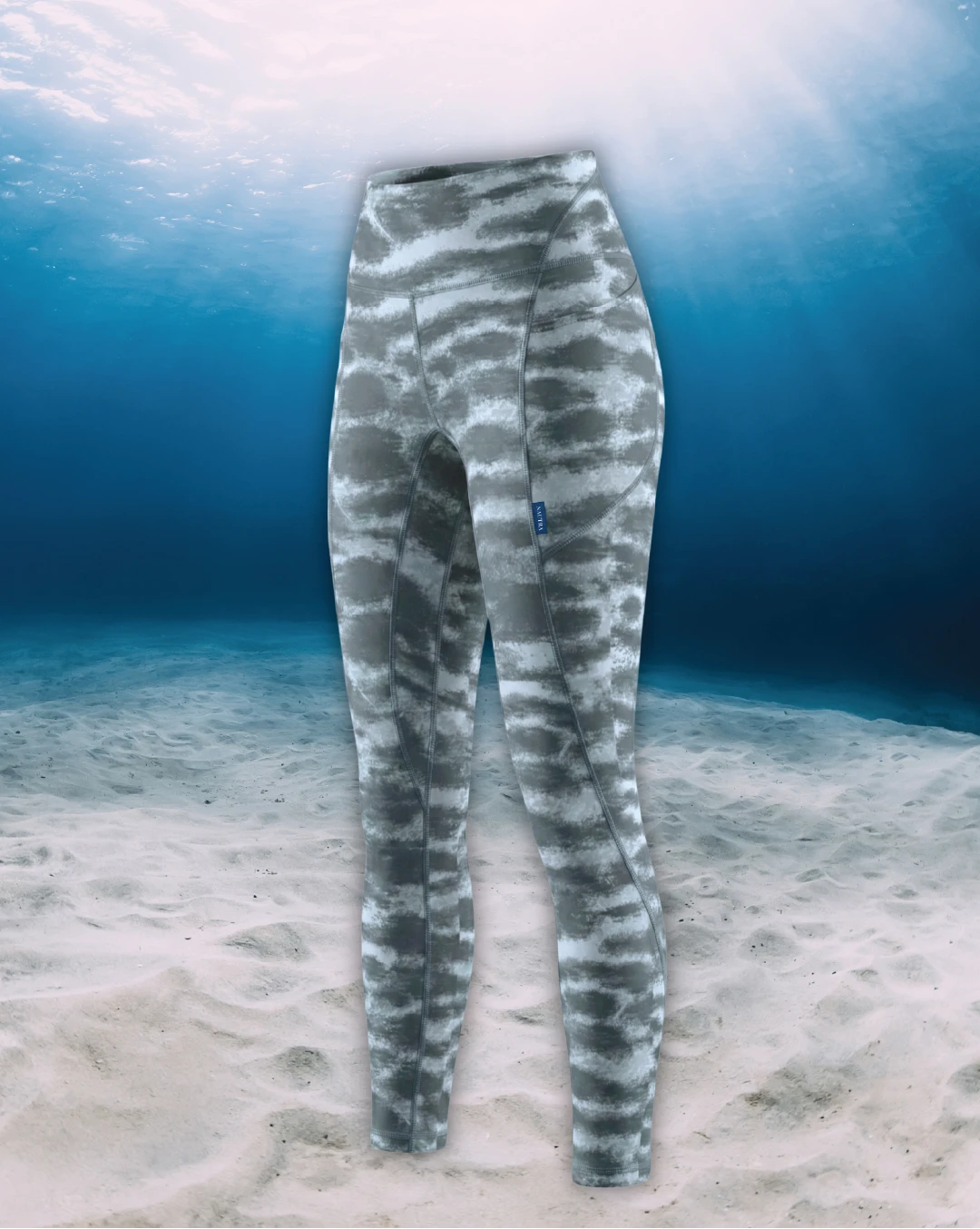 Tiger Shark Full Length Active Swim Leggings side view on ghost mannequin, made from recycled fishing nets and designed for movement in and around the water.