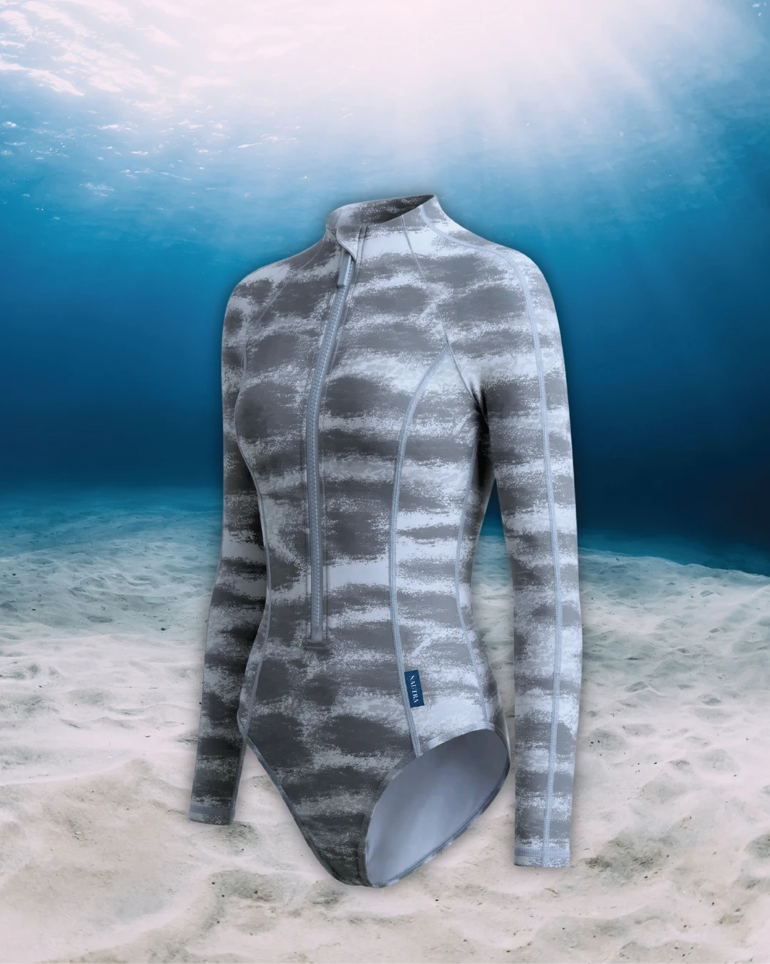 Tiger Shark Long Sleeve Swimsuit side view on ghost mannequin, made from recycled fishing nets and designed for movement in and around the water.